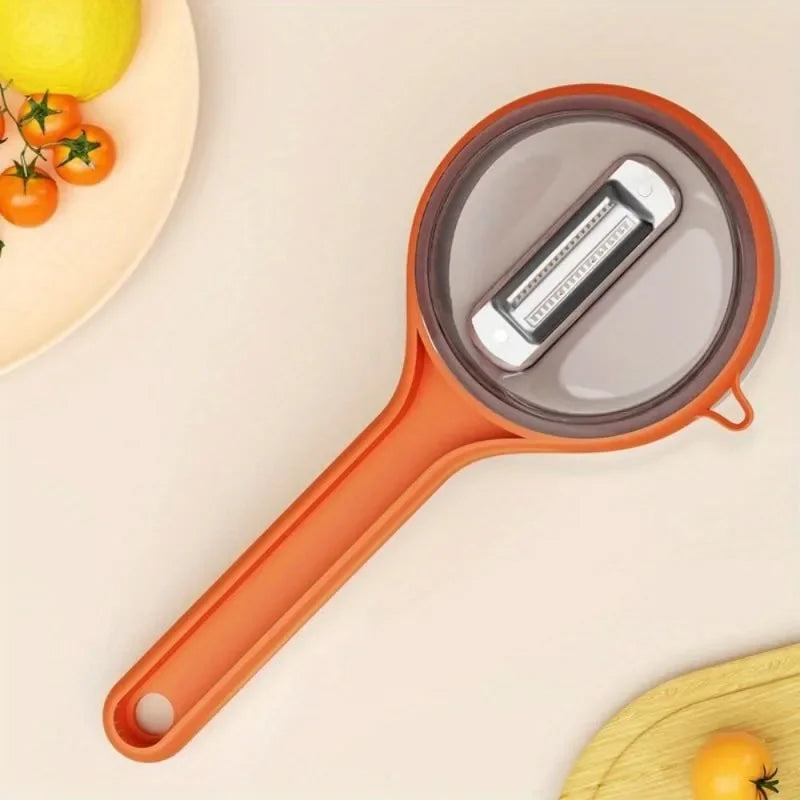 Multi-Functional Peeler With Storage Box

